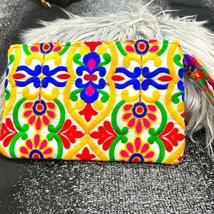 Multi color purse, 2 zipper pocket, elegant look.
